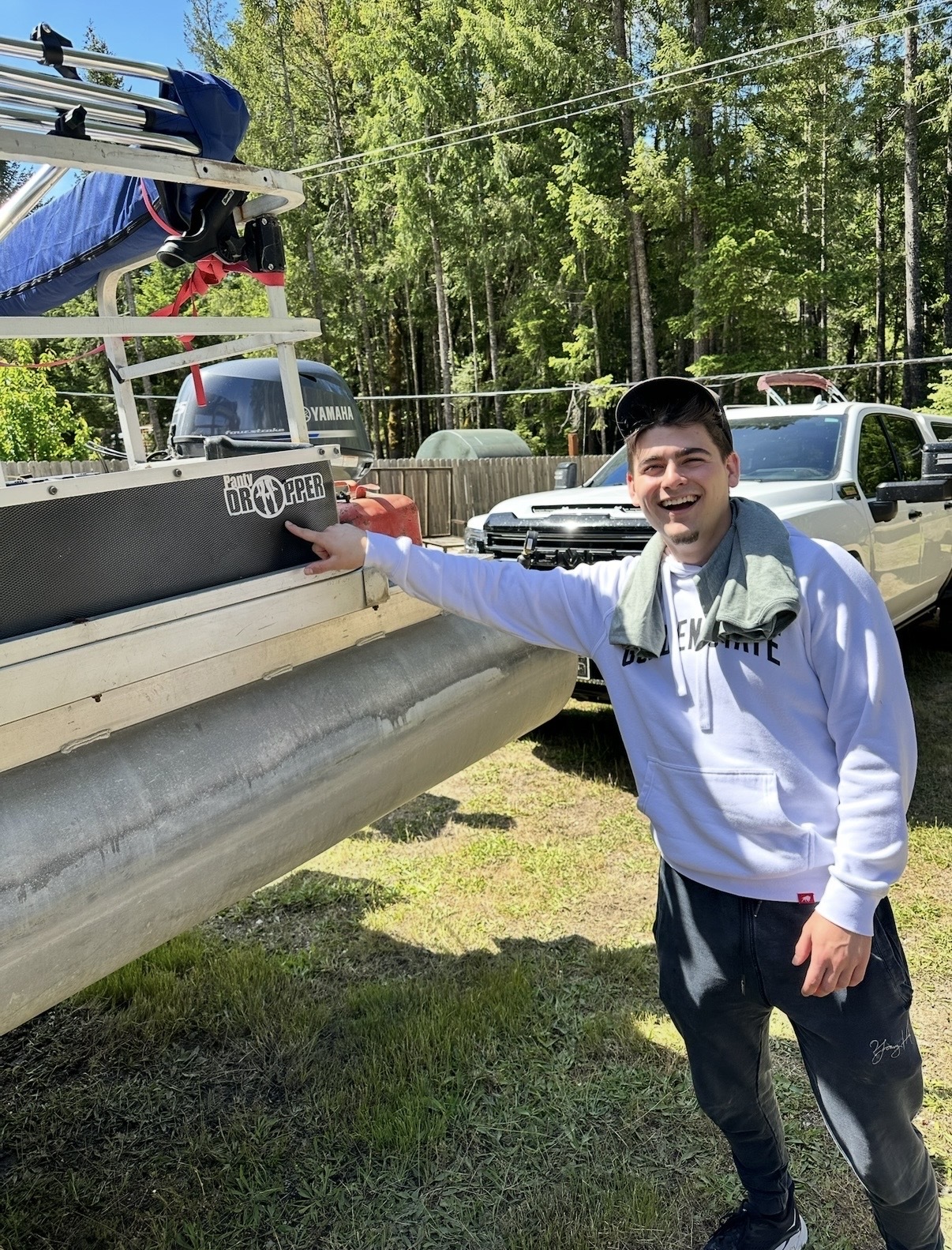 Kyler pointing at his 'Panty Dropper' boat
